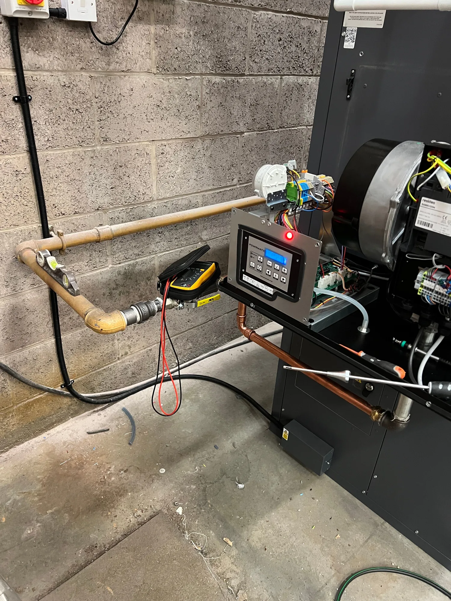 Commissioning the new warm air heater and testing the gas and controls