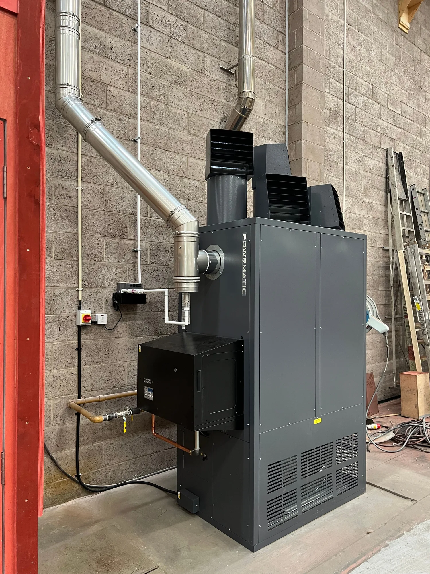 New Powrmatic CX 175 kW warm air cabinet heater installed by Sensible Building Services at Scottish Opera in Glasgow