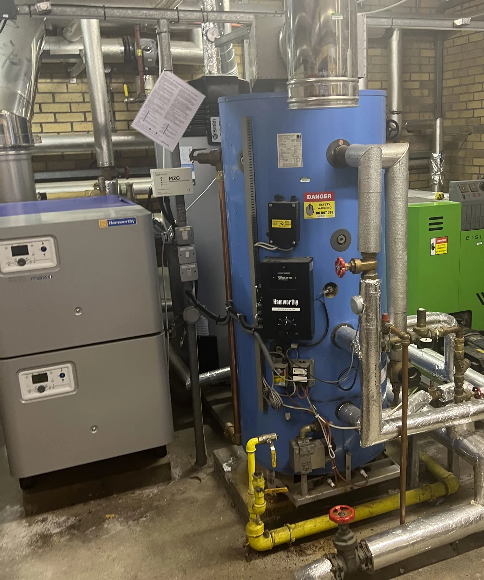 New commercial boiler and hot water plant in a plant room